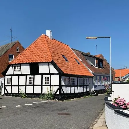 White Half-timbering House Next To The Harbour Marstal
